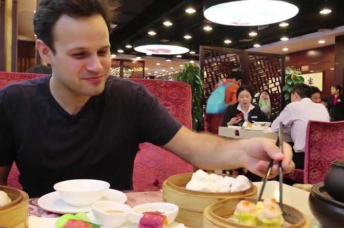 3-Hour Private Night Tour: Beijing Foodie Experience - Xinjiang Taste Restaurant: kabobs, side dishes, and Erguotou