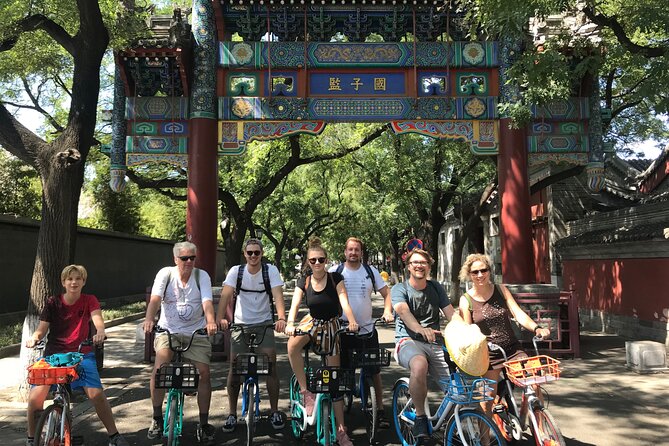 Beijing City Four-hour Bicycle Tour With a Private Guide - Drum and Bell Tower Square: Watching Beijing Do Its Thing
