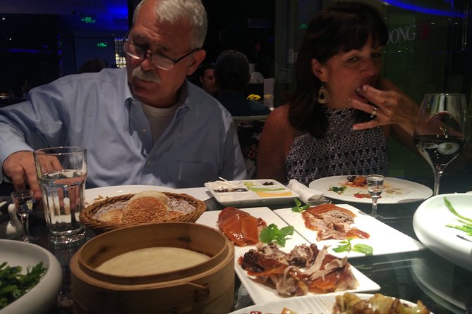 Beijing Evening Tour: Chaoyang Acrobatic Show with Peking Duck Dinner - Key highlights for this Beijing evening