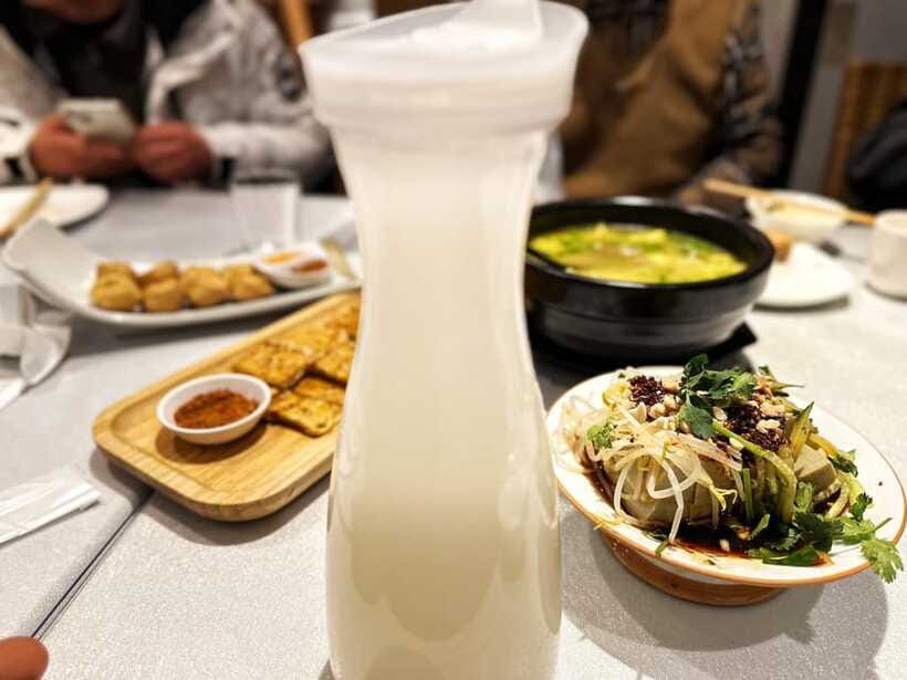 Beijing Hutong Food Crawl Delights: Peking duck, Hotpot&More - Yunnan-Style Hutong Fare: Cross-Bridge Noodles and More