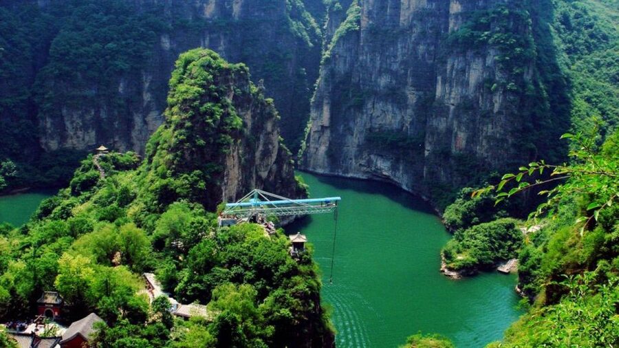 Beijing: Longqing Gorge, Ming Tombs & Lunch Private Day Tour - Moon Island temples and optional water sports