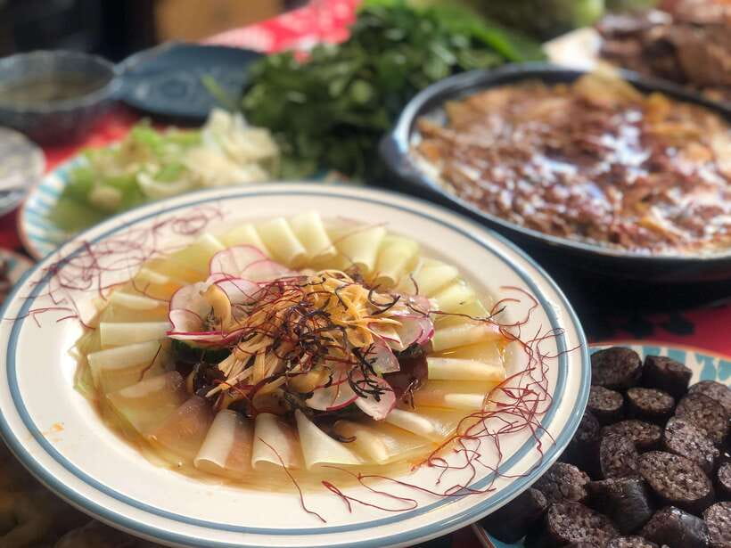 Beijing Market Tour with 10-course Family Feast - Inside the home: cooking support and a possible dumpling lesson