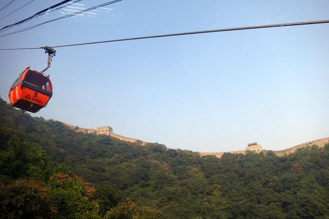 Boutique Early Bird or Sunset Tour of Mutianyu with VIP Pass - Sunset option and the dinner detail at 12:30PM