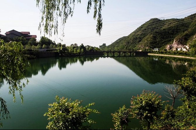 Longqing Gorge and Guyaju Caves Excursion With English Speaking Driver - Price and logistics: is $158 value for a private day trip?