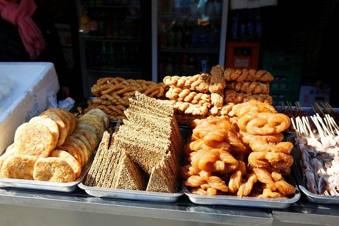 Peking Duck & Beyond:Exploring the Best Eats in Beijing's Hutongs - Drinks Included: Unlimited Soft Drinks and Beer