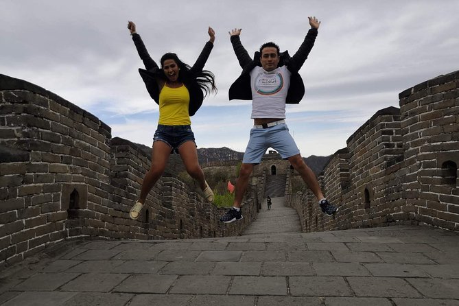 Private Mutianyu Great Wall Trip With English-Speaking Driver - Arrival at Mutianyu, Entrance Fee, Shuttle Bus, and What to Expect Next